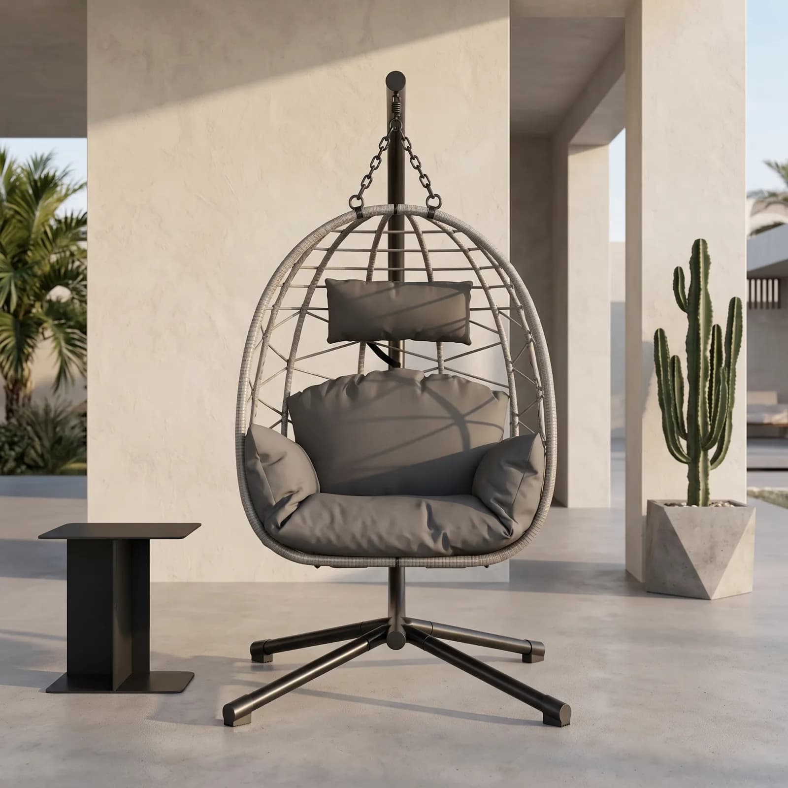 Fauteuil œuf suspendu en rotin avec support et coussins